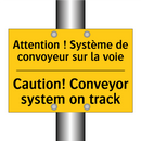 Attention ! Système de convoyeur  /.../ - Caution! Conveyor system on track /.../
