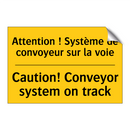 Attention ! Système de convoyeur  /.../ - Caution! Conveyor system on track /.../