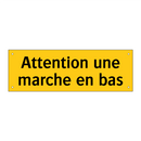Attention une marche en bas