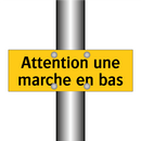 Attention une marche en bas