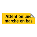 Attention une marche en bas