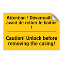 Attention ! Déverrouillez avant  /.../ - Caution! Unlock before removing  /.../