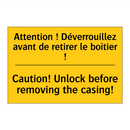 Attention ! Déverrouillez avant  /.../ - Caution! Unlock before removing  /.../