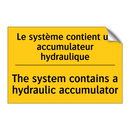 Le système contient un accumulateur  /.../ - The system contains a hydraulic  /.../