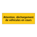 Attention, déchargement de véhicules en cours