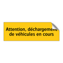 Attention, déchargement de véhicules en cours