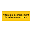 Attention, déchargement de véhicules en cours