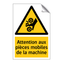 Attention aux pièces mobiles de la machine