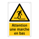 Attention une marche en bas