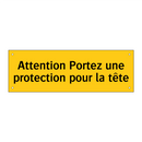 Attention Portez une protection pour la tête