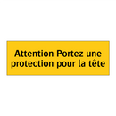 Attention Portez une protection pour la tête