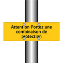 Attention Portez une combinaison de protection