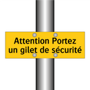 Attention Portez un gilet de sécurité