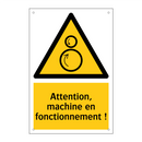 Attention, machine en fonctionnement !