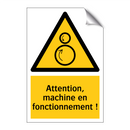 Attention, machine en fonctionnement !