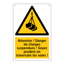 Attention ! Danger de charges suspendues ! Soyez prudent en traversant les voies !
