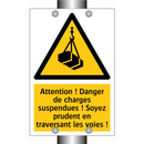 Attention ! Danger de charges suspendues ! Soyez prudent en traversant les voies !