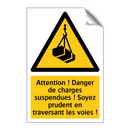Attention ! Danger de charges suspendues ! Soyez prudent en traversant les voies !