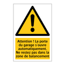 Attention ! La porte du garage s'ouvre automatiquement. Ne restez pas dans la zone de balancement