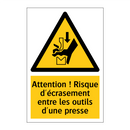 Attention ! Risque d'écrasement entre les outils d'une presse