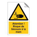 Attention ! Risque de blessure à la main
