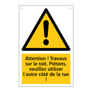 Attention ! Travaux sur le toit. Piétons, veuillez utiliser l'autre côté de la rue !