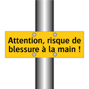 Attention, risque de blessure à la main !