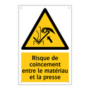 Risque de coincement entre le matériau et la presse