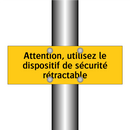 Attention, utilisez le dispositif de sécurité rétractable