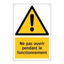 Ne pas ouvrir pendant le fonctionnement