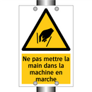 Ne pas mettre la main dans la machine en marche