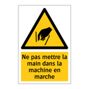 Ne pas mettre la main dans la machine en marche
