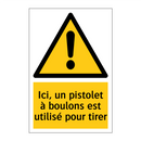 Ici, un pistolet à boulons est utilisé pour tirer