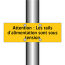 Attention : Les rails d'alimentation sont sous tension