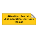 Attention : Les rails d'alimentation sont sous tension