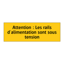 Attention : Les rails d'alimentation sont sous tension