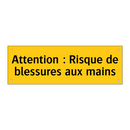 Attention : Risque de blessures aux mains