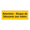 Attention : Risque de blessures aux mains