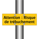 Attention : Risque de trébuchement