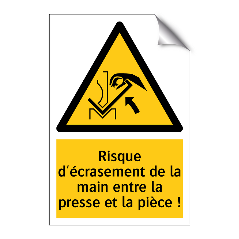 Risque d'écrasement de la main entre la presse et la pièce !