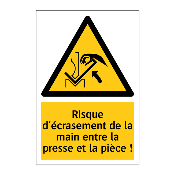 Risque d'écrasement de la main entre la presse et la pièce !