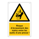 Risque d'écrasement des mains entre les outils d'une presse !