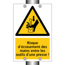 Risque d'écrasement des mains entre les outils d'une presse !