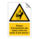 Risque d'écrasement des mains entre les outils d'une presse !