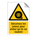 Sécurisez les pneus pour éviter qu'ils ne roulent