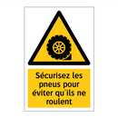 Sécurisez les pneus pour éviter qu'ils ne roulent