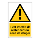 Il est interdit de rester dans la zone de danger