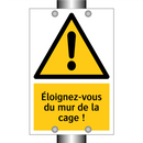 Éloignez-vous du mur de la cage !