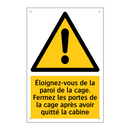 Éloignez-vous de la paroi de la cage. Fermez les portes de la cage après avoir quitté la cabine