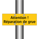 Attention ! Réparation de grue